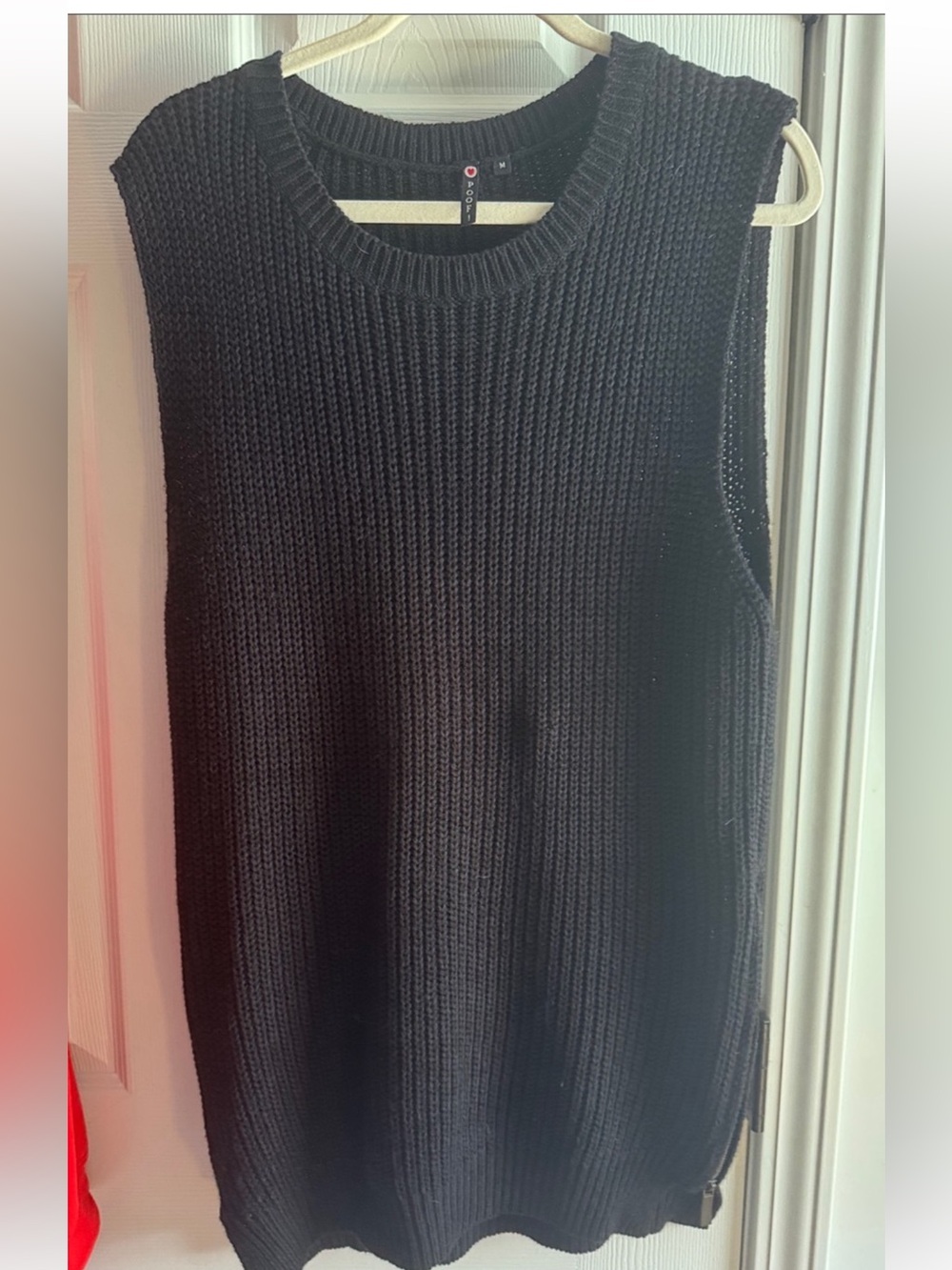 Knit black sweater with side zippers/ short skirt